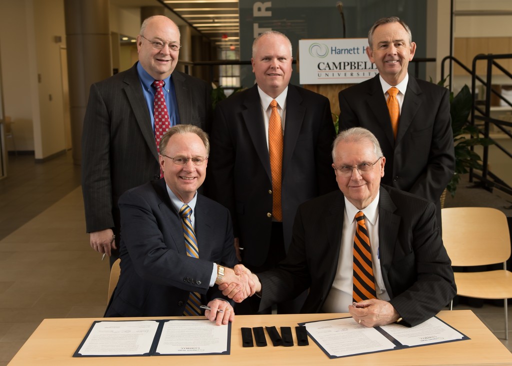 Seated Left to Right: Ken Bryan, President and CEO of Harnett Health, and Jerry Wallace, President of Campbell University     Standing Left to Right: Wallace Horne, MD, Vice President of Medical Affairs at Harnett Health; John Kauffman, DO, Dean of the Jerry M. Wallace School of Osteopathic Medicine at Campbell University; Ronald Maddox, PharmD, Chairman of the Harnett Health Board of Trustees and  Vice President for Health Programs & Dean of the College of Pharmacy and Health Sciences at Campbell University     