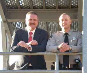 Dr. Robert Powell (left), chair of Central Carolina Community College’s Justice Studies Department and director of its Basic Law Enforcement Training program, and Harnett County Sheriff’s Department Deputy Michael Klingman, stand on the rescue tower at the college’s Emergency Services Training Center, in Sanford. Klingman is a graduate of the BLET program and credits his training for the skills he and other graduates bring to their duties. For more information about the BLET program at CCCC, visit www.cccc.edu or contact Robert Powell at 919-777-7774 or by e-mail at rpowe254@cccc.edu.           