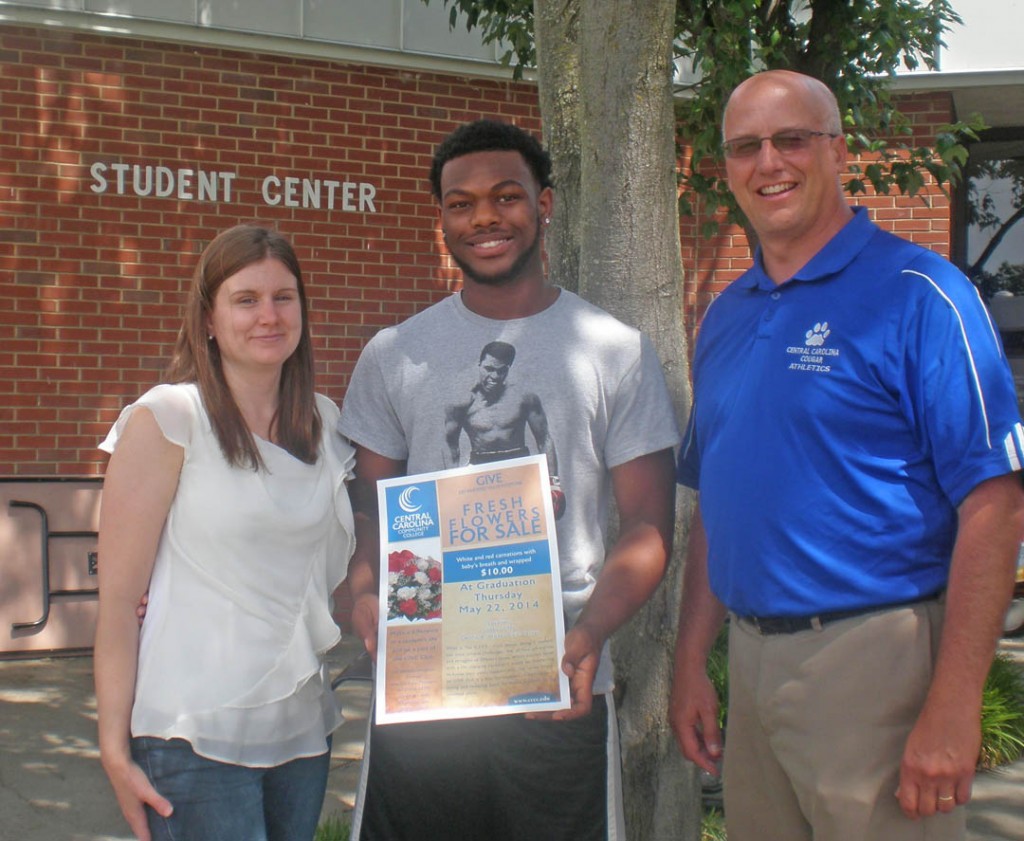 Central Carolina Community College’s GIVE Club provides an opportunity for students to make a difference by helping others. GIVE Club Advisor Kimberly Brzozowski (from left), student member Tobechi Opara, and CCCC Student Activities Director Mike Neal advertise one of the club’s fundraising events.